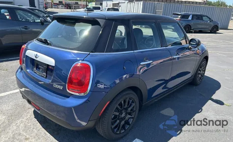 2015 Mini Cooper from USA, damaged, VIN WMWXS5C5XFT831166